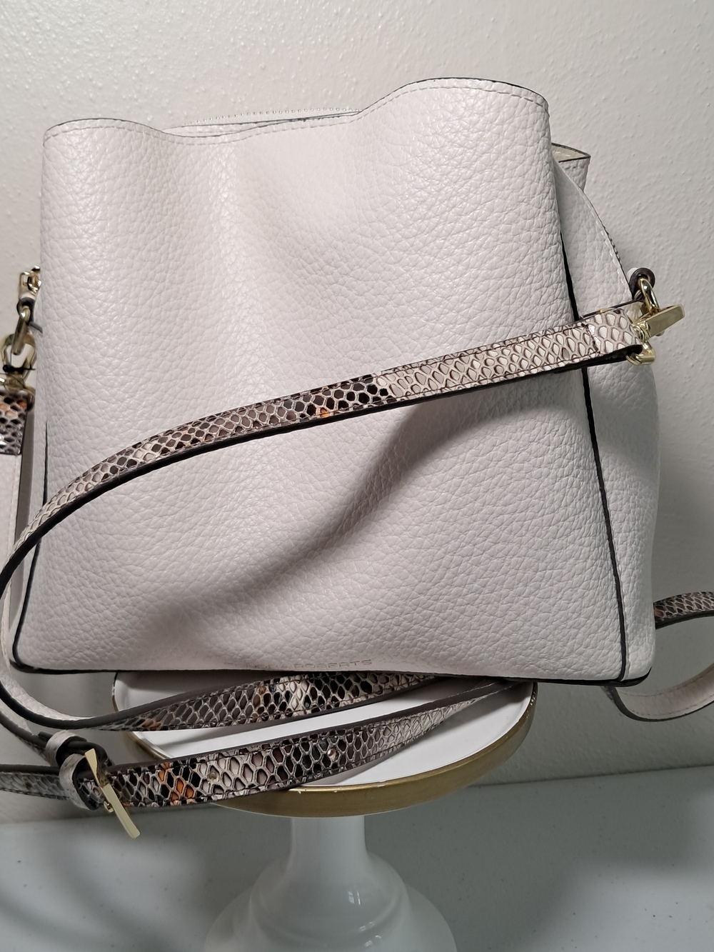 Sondra Roberts Beige Pebbled Crossbody Bucket Bag Snake-Trim Strap